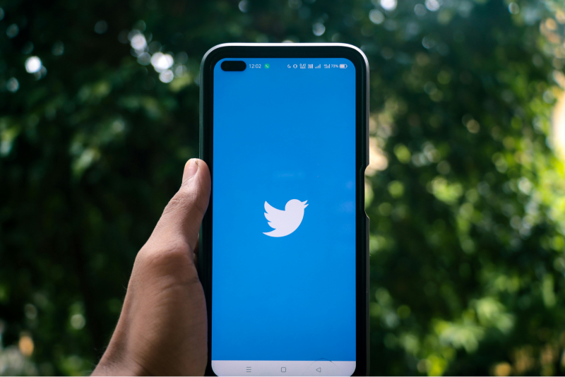 Image showing phone with Twitter/X interface